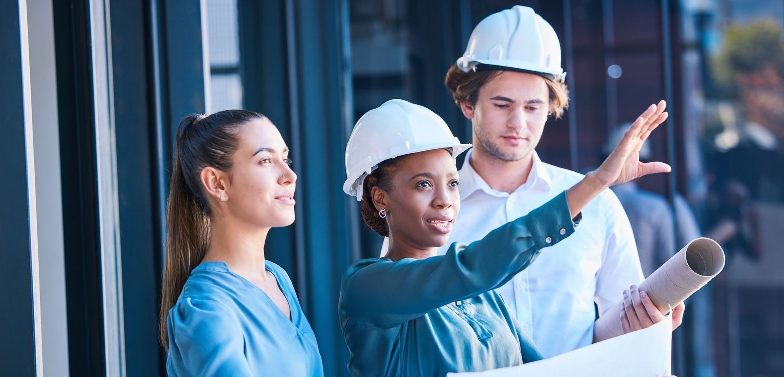 Three engineers on the work site
