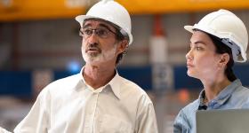 Two engineers managing a project
