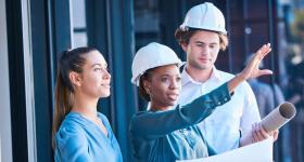 Three engineers on the work site